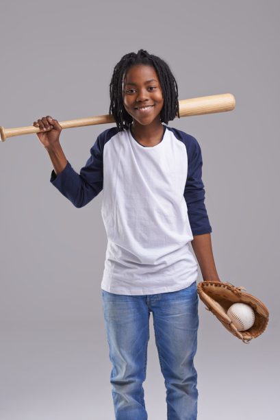 Ready to have a ball. Studio shot of a young boy with baseball gear