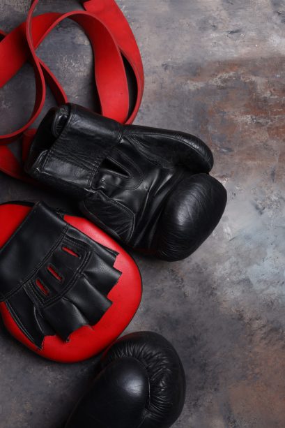 sports equipment for boxing gloves on a dark background